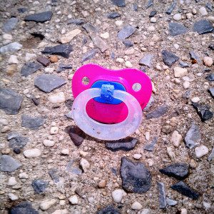 pacifier on the ground